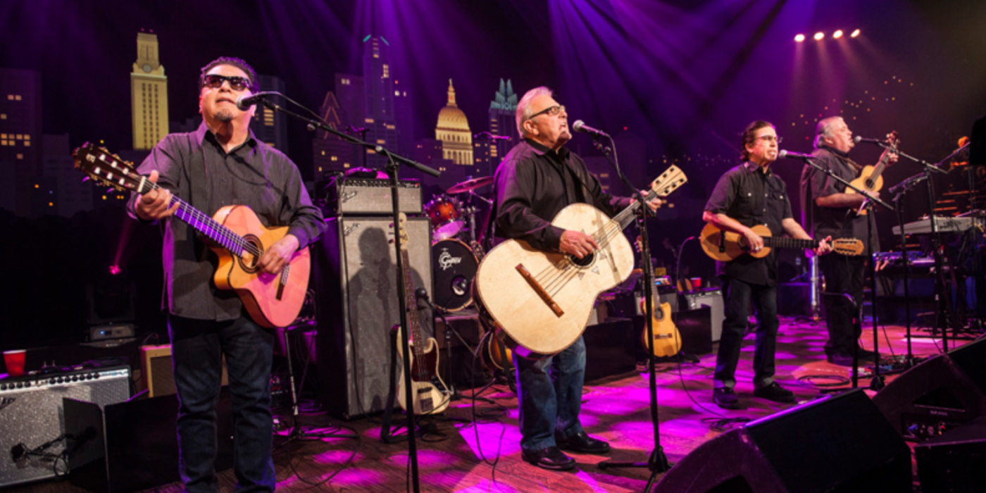 Los Lobos performing on stage